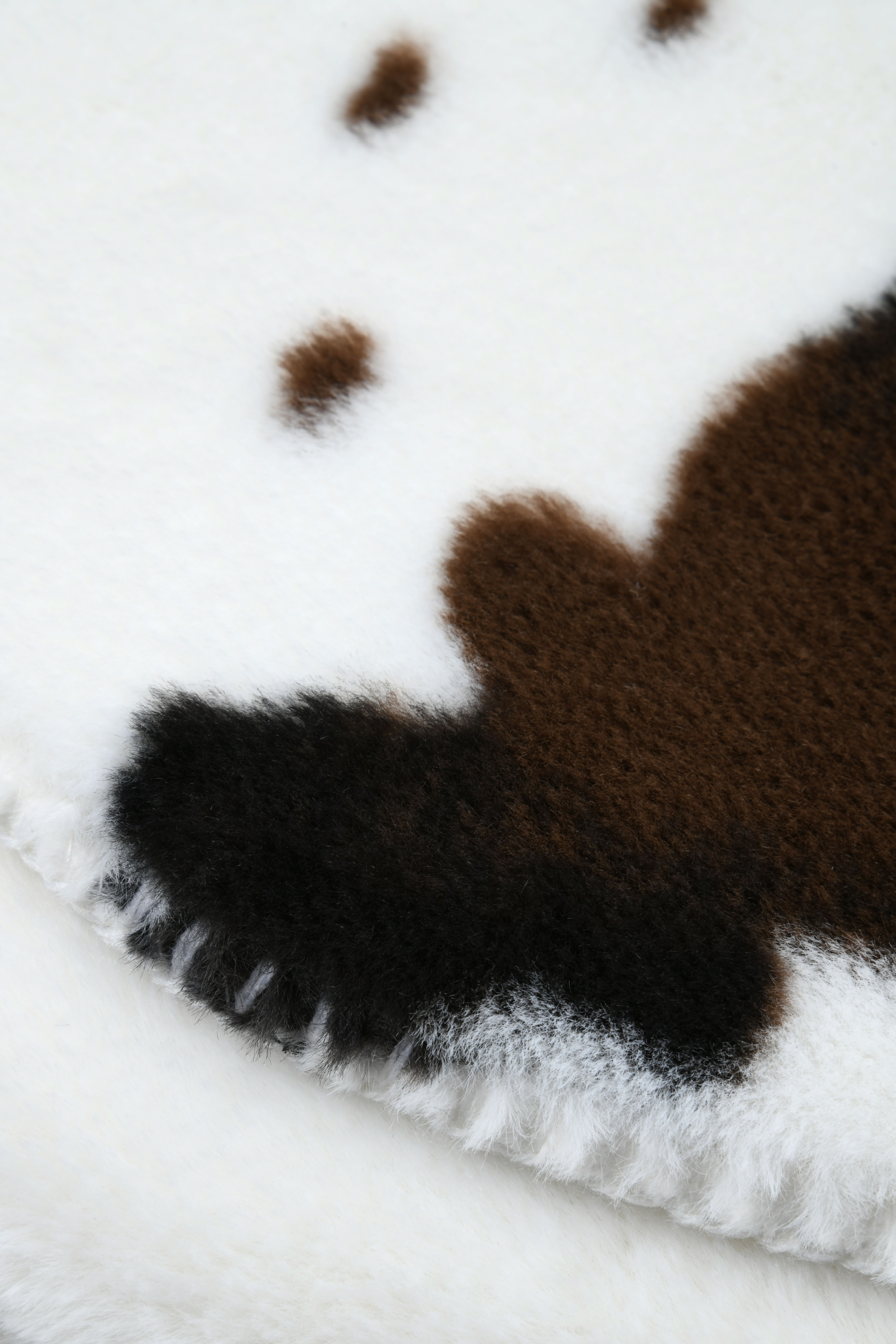 Plaid aspect peau de vache HOMETEX