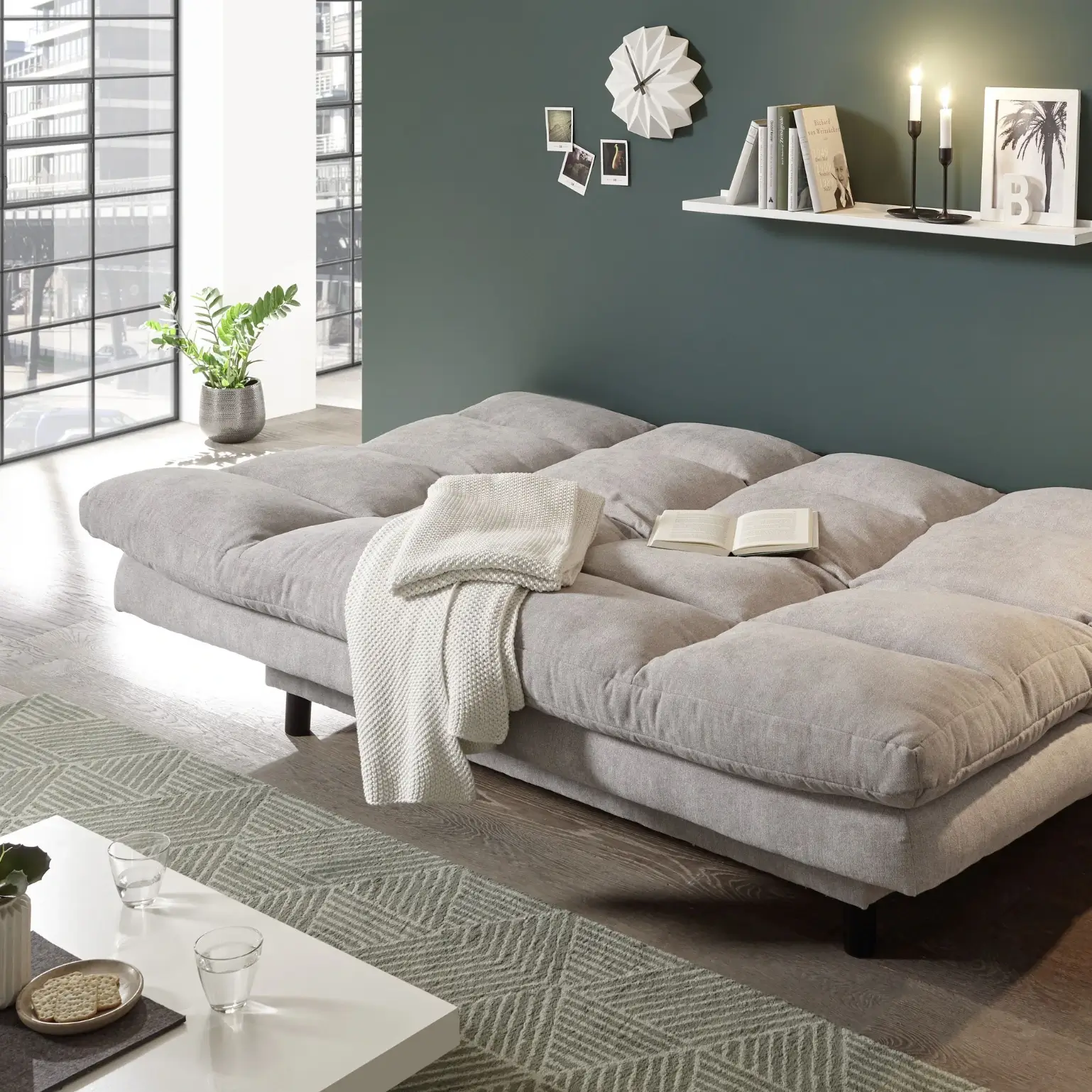 Canapé-lit LOTTA en gris clair avec des ressorts ondulés de haute qualité. L/H/P env. 190/85/95 cm